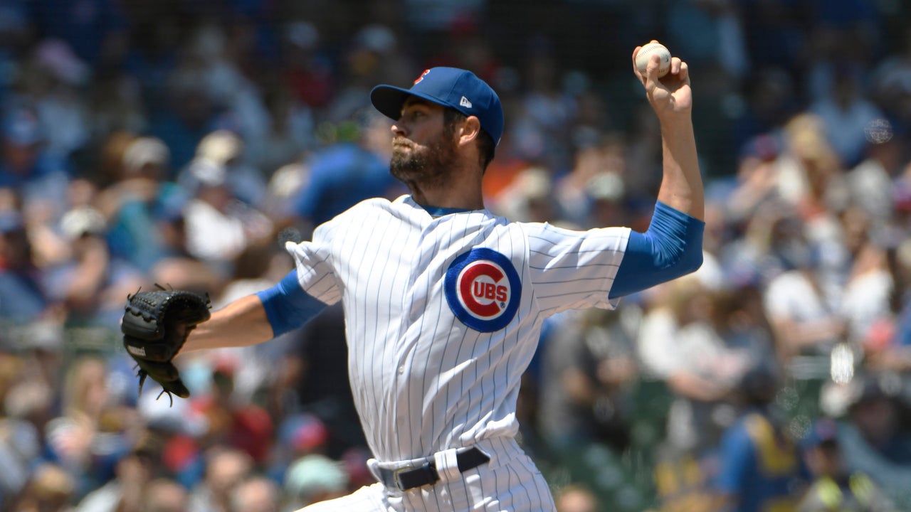 Hamels, Báez lead Cubs past Cardinals 3-1